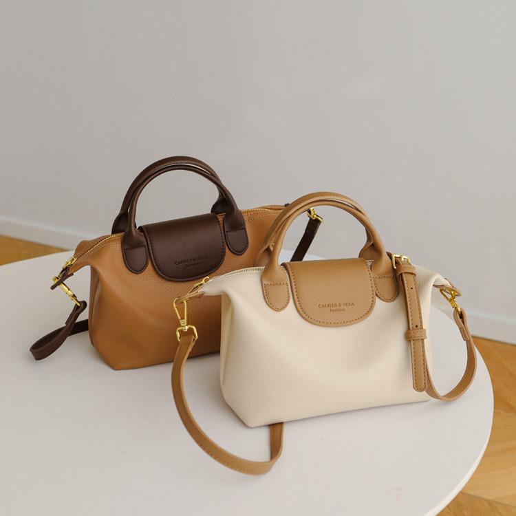 Amélie Contrast-Trim Vegan Leather Top Handle Bag AM29